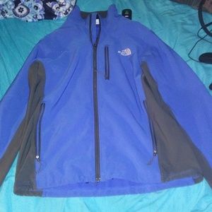 Blue and black Northface jacket